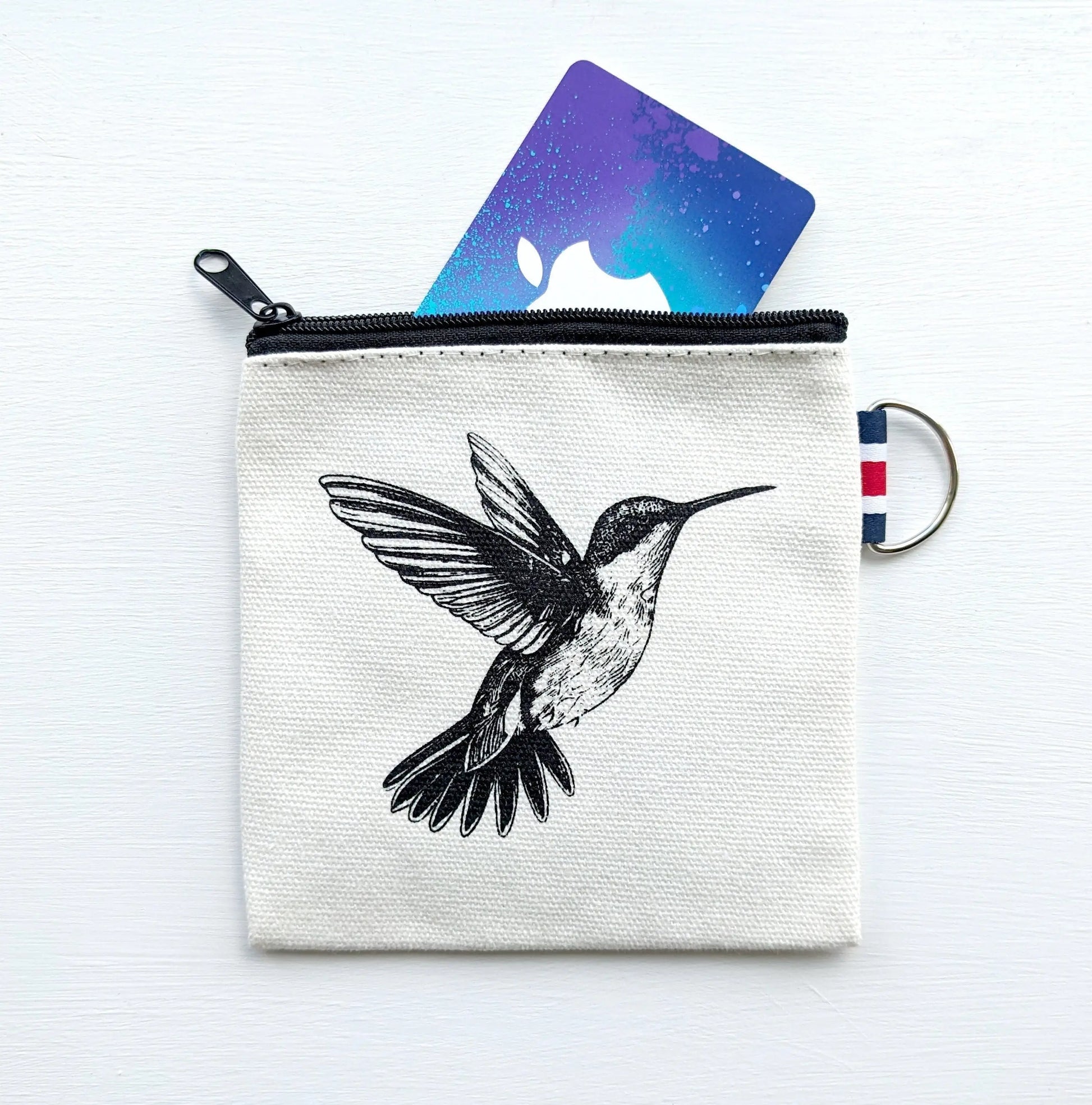 Canvas coin purse with black illustrated hummingbird and card holder, zipper closure